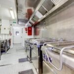 rie-val-st-quentin-cuisine-provisoire-vue-ligne-cuisson